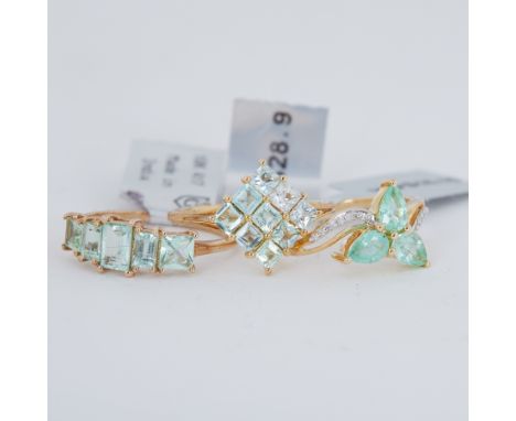 A 9ct yellow gold five stone ring set with 1.48 carats of Paraiba tourmaline, 2.42gm (with tag), size R 1/2 to S, a 9ct yello