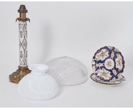 A 19th century extendable lamp, three 19th century plates, a crystal cut glass lamp shade and another.