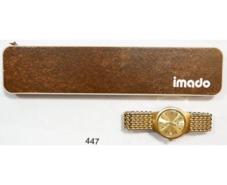 An Imado 'Tuning Fork' gentleman's watch in Imado box with guarantee 1990 
