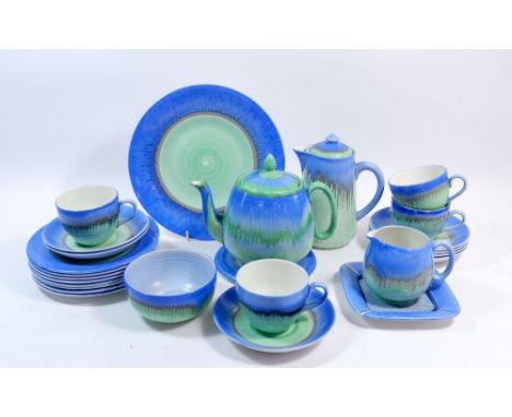A Shelley Art Deco blue and green Harmony tea service comprising: four cups, seven saucers, eight side plates, teapot, coffee