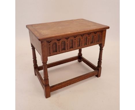 A vintage oak low work table with carved frieze, 52 x 35 x 25cm 