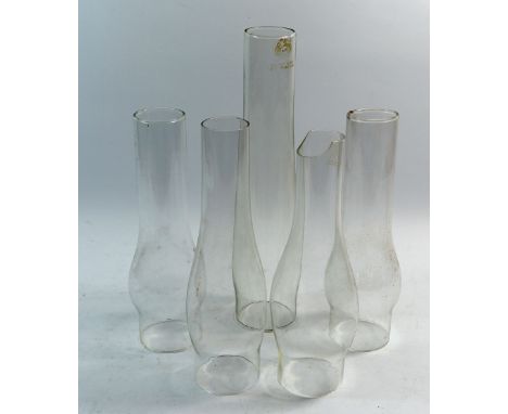 A group of four glass oil lamp funnels 