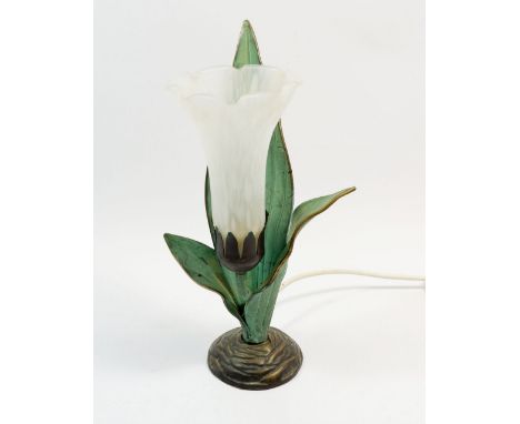 A cast metal and glass organic formed table lamp, 31cm high 