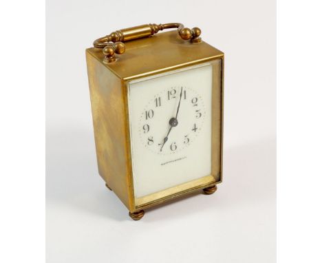 An Edwardian Mappin &amp; Webb Ltd brass cased carriage clock with enamel dial and French movement, 11cm tall 