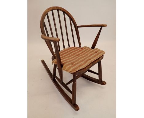 A stick back rocking chair 