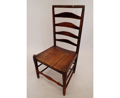 A provincial ladder back chair with elm seat 