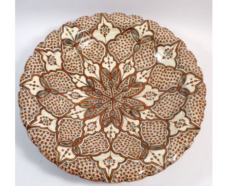 A large Safi ceramic dish with pie crust rim, 44.5cm diameter 
