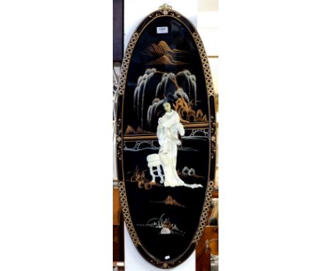 A Chinese vintage lacquer oval panel with applied mother of pearl lady, 91 x 35cm 