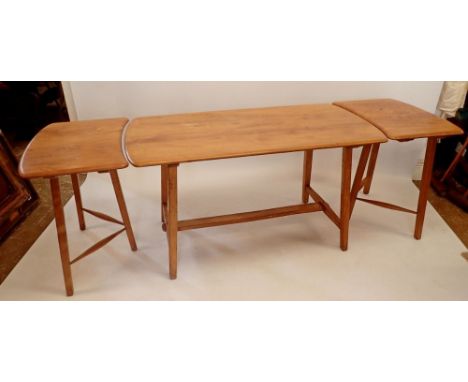 A mid century Ercol style light elm dining table with two freestanding extension leaves, 137 x 68cm, each leaf 49cm, total le