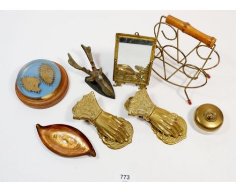 A collection of brass and metal items including two brass hand clips, a cast stags head door knocker, a Studio Cellini Rame D