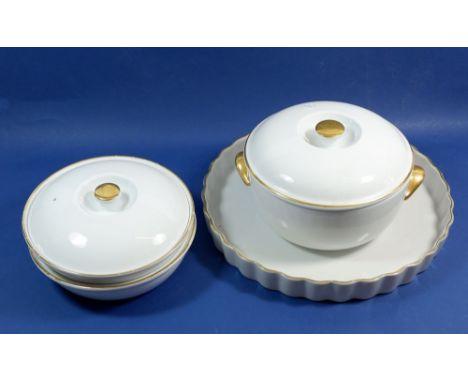 Three Royal Worcester gilt and white serving dishes and a large flan dish