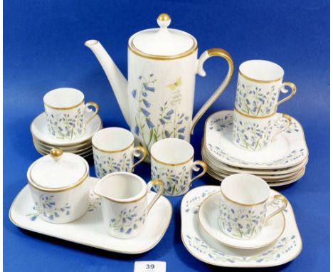 A Swedish Hackefors coffee set comprising: coffee pot, six cups and saucers, six tea plates, milk, sugar and tray 