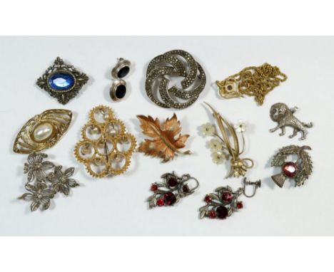 A box of vintage costume jewellery to include a silver marcasite brooch, oval silver and black stone earrings etc. 