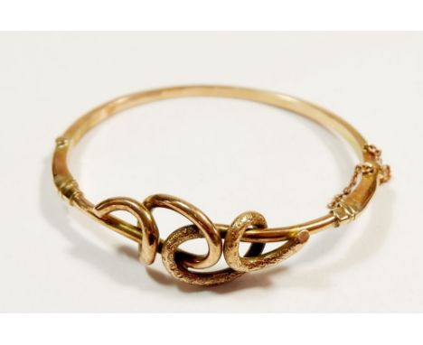 A Victorian 9ct gold knotted hinged bangle, 8.4g 