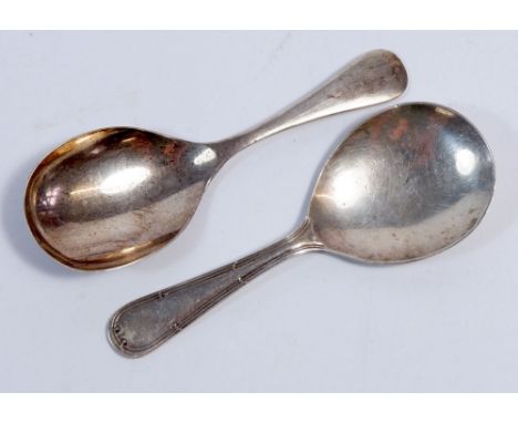 Two silver tea caddy spoons, Birmingham 1931 and Sheffield 1945 
