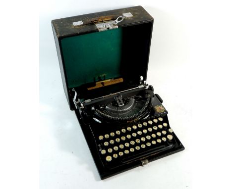An antique small Imperial black typewriter CZ985 in fitted case, 26cm wide 