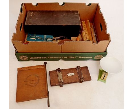 A box of collectables including a single 'Advance' card index cabinet drawer, various wooden rules include Rabone, a 'Crown' 