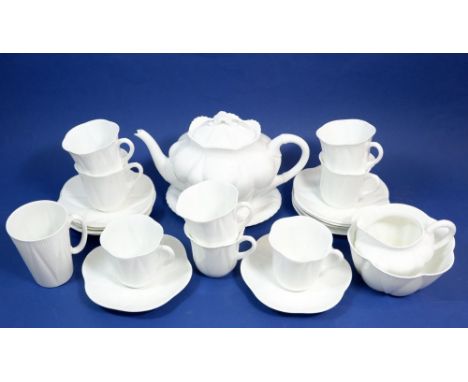 A Shelley Dainty tea service comprising: teapot (spout a/f), eight cups and saucers and two extra saucers, jug, sugar and cof