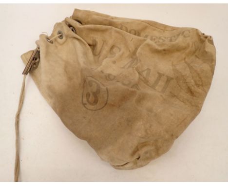 A vintage US Mail canvas bag with metal lock and paper insert "Baltimore 101 Fifth Avenue" approximately 50 x 50cm 