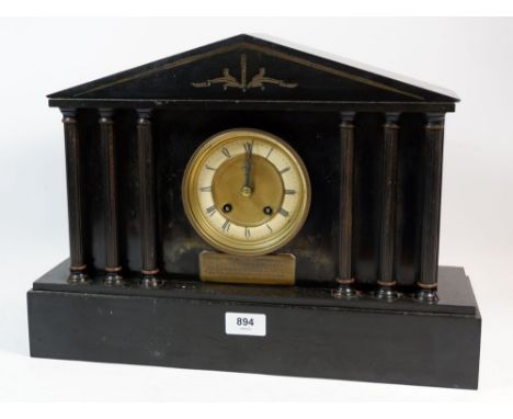 A Victorian slate architectural style mantel clock, 43cm wide 