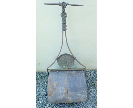 A large Victorian garden roller 