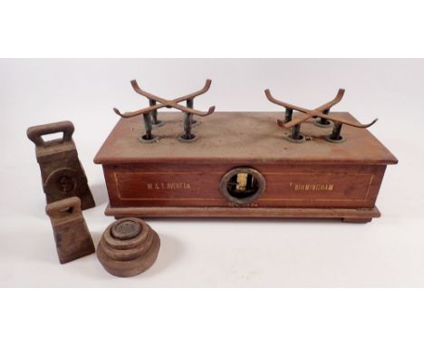 A pair of W &amp; T Avery mahogany scales, marked Birmingham and various weights, 36cm wide 