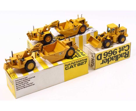 An NZG 1/50 scale Caterpillar construction group of three boxed examples to include No. 237 wheel type loader 966D, No. 122 C
