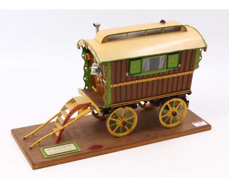 A well-made 3/4 inch scale Reading Type Romany Vardo, built 1974 by Mrs Pear D Whalley of Coventry, raised on wooden base wit