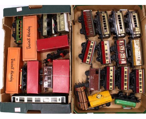 Two trays containing mainly unboxed Hornby 0-gauge goods and passenger vehicles. French bogie goods van &amp; ‘Arbel’ hopper 