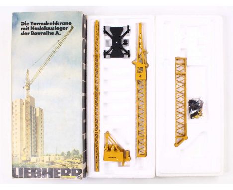 A Gescha Models 1/50 scale diecast model of an A series Liebherr Tower Crane with Luffing Jib of usual colourway housed in po