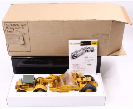 A Classic Construction Models 1/48 scale McCoy edition Caterpillar 666 Wheeled Tractor Scraper Housed in a polystyrene packed