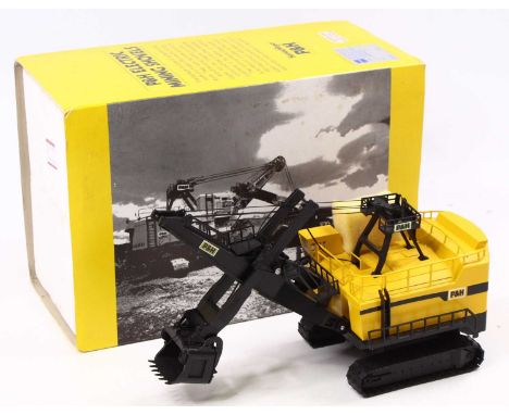 A Conrad No. 2940 1/87 scale diecast model of a P&amp;H electric mining shovel finished in yellow and black, housed in the or