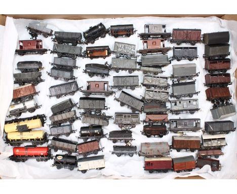 Approx 128 x 3mm scale goods wagons, almost all kit built in metal and/or plastic. Some require refurbishment where wheels or
