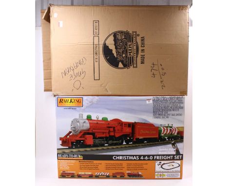 Rail King by MTH Christmas 4-6-0 Freight Set comprising  loco &amp; tender, 3 freight cars, controllers &amp; track. Includes
