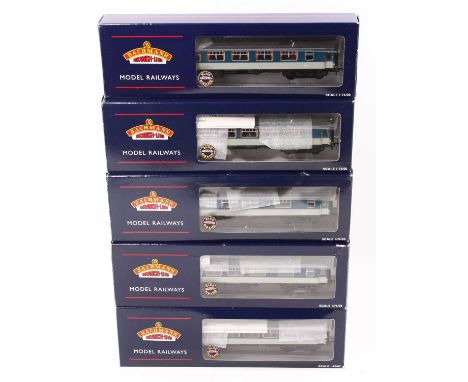 Five Bachmann Branch-line Mk1Pullman coaches blue/grey with lighting: 39-281 Kitchen 1st; 39-291 Parlour 1st; 39-301 Kitchen 