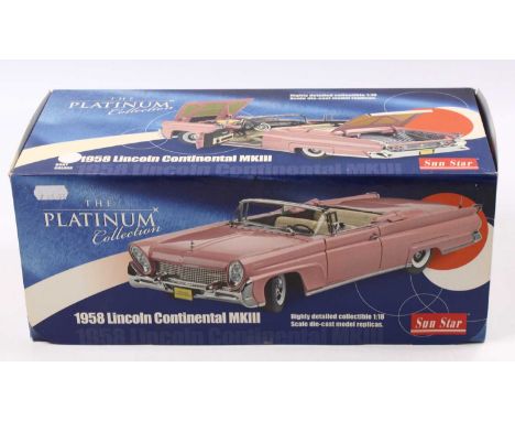 A Sun Star No. 4701 1/18 scale diecast model of a 1958 Lincoln Continental Mk III, finished in Star Mist white, housed in the