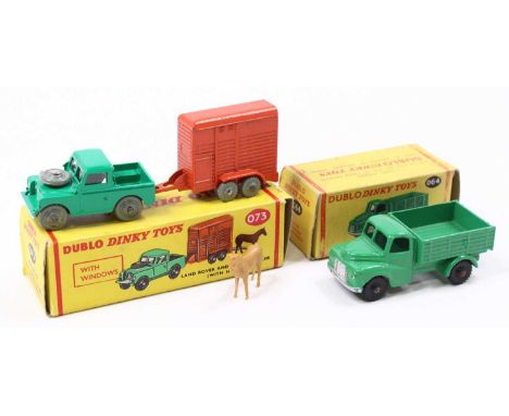 Two Dublo Dinky Toys: 064 Austin Lorry, green, black treaded tyres (M) (BVG) some scuffing; 073 Land Rover with horse trailer