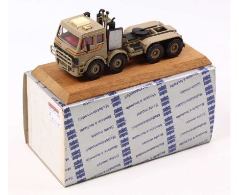 A Conrad special limited edition 1/50 scale model of a No. 3009 Mercedes Benz Heavy-Duty Articulated Tractor unit mounted on 