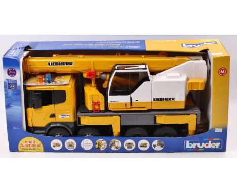 A Mack Bruder BR 1/16 scale boxed model of a Scania R Series Liebherr crane with a light and sound module