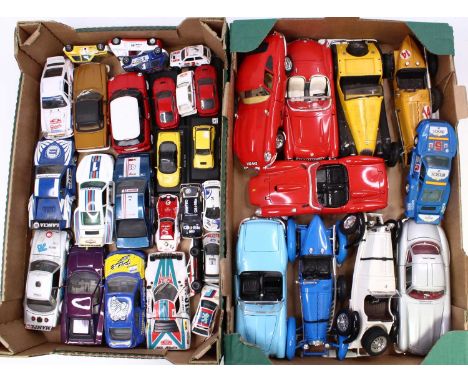 Two trays containing a quantity of mixed scale modern issue diecast to include Burago, Polistil, Vitesse, and others, to incl