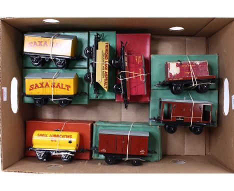 Eight Hornby 0-gauge No.50 wagons: two Saxa Salt (VG-E) green boxes (BVG-E); ‘Shell Lubricating Oil’ tank (NM) orange (BVG-E)