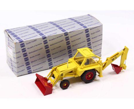 A Kent Models Conrad 1/35 scale model of a JCB 3 Tractor Back Hoe in yellow body with red hubs and red shovels housed in Conr