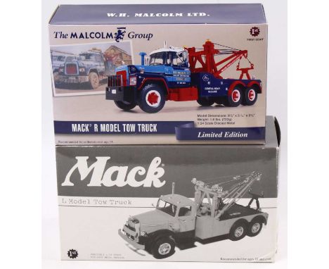 A Mack group of two boxed models to include a limited edition model tow truck by First Gear together with L Model tow truck 1