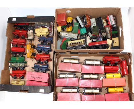 Three trays containing Hornby wagons from all eras including a few from the very early 1920’s. Two trays contain petrol &amp;