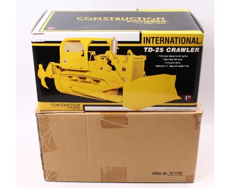 A First Gear 1/25 scale diecast model of an international TD-25 crawler, housed in a polystyrene packed box with operator's m