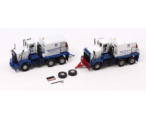 Two ASAM Models 1/48 scale kit built of a No. CQ61C Pacific Ultra Heavy Towing Trucks, with white cabs and blue bases, red dr