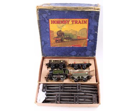 1947-9 Hornby No.201 clockwork tank goods set comprising No.101 Southern E126  0-4-0 loco with some scratches to top of boile
