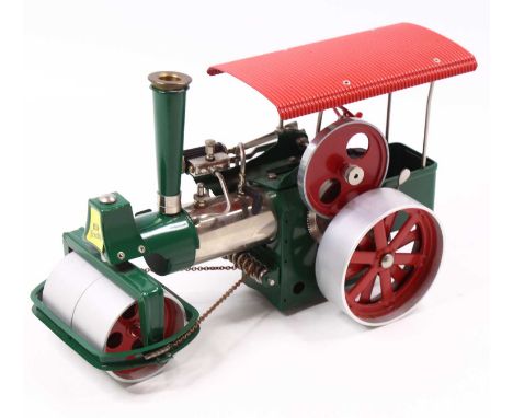 Wilesco Old Smoky steam roller traction engine comprising of green, chrome and red body complete with funnel and burner, loos