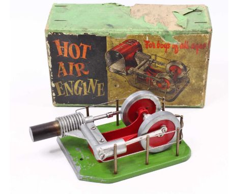A Davies Charlton Ltd of the Isle of Man, boxed stationary hot air engine, finished in green and red with usual expected fitt
