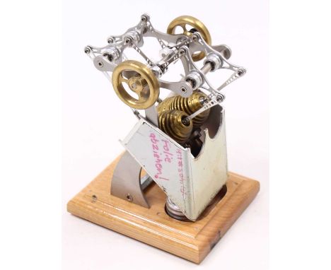 Scientific Twin Cylinder Hot Air Engine, machined from gun metal and brass components with double single wick burners, raised